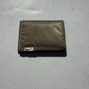 Old vintage Y2K Nike trifold wallet in an olive green
